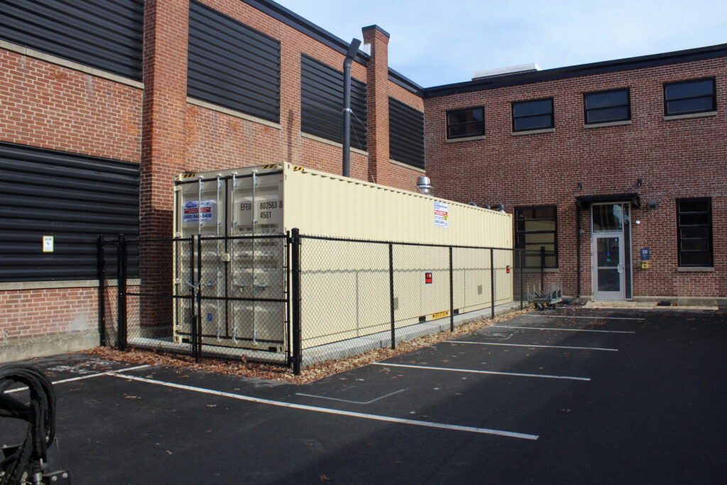 enclosure and fencing shown for new installation and final inspection of a sub slab depressurization system installed in eastern mass